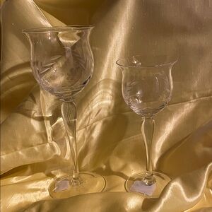 Floral splendor, set of two Lenox crystal daisy candlestick votives.